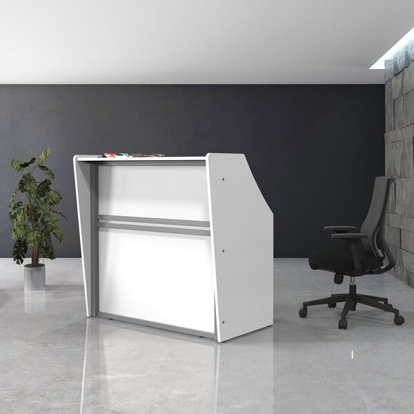 A white Correll reception desk with a gray and white surface in a room with a black office chair and a plant.
