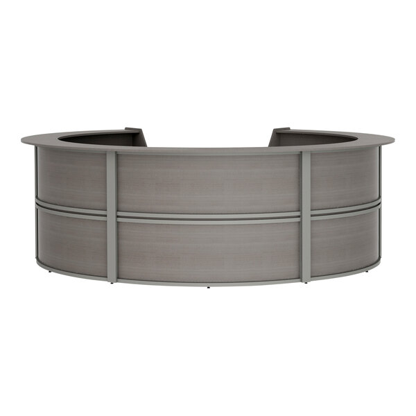 A grey curved Correll reception counter.