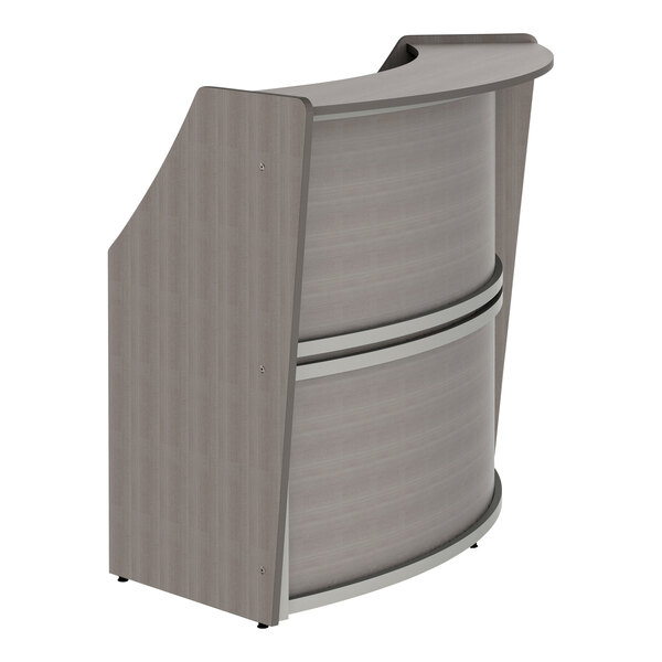 A grey Correll laminate reception counter with a curved top.
