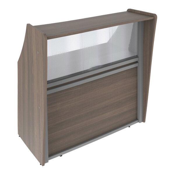 A Correll walnut laminate reception desk with a see-through counter panel.