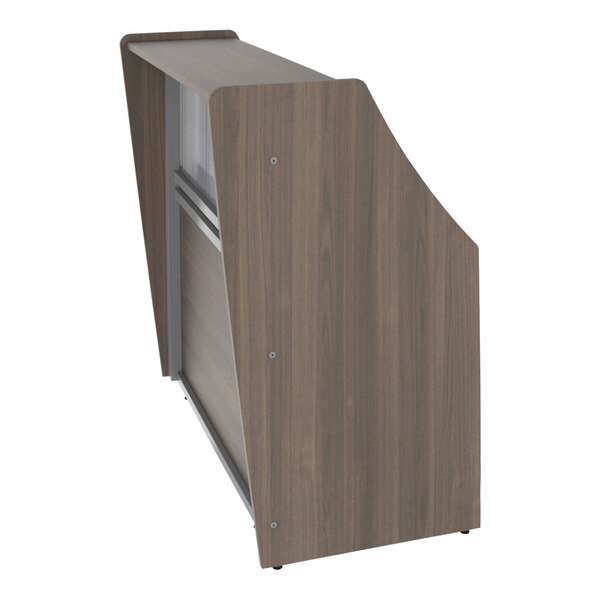 A walnut laminate reception desk with a see-through counter panel.