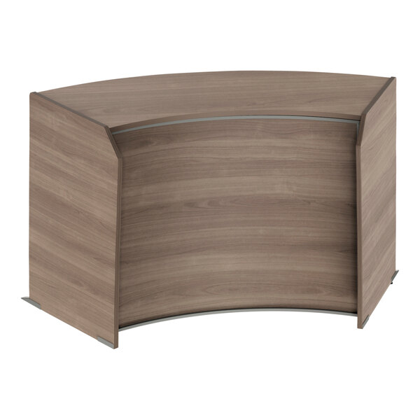 A Correll wooden curved reception desk with a curved top.
