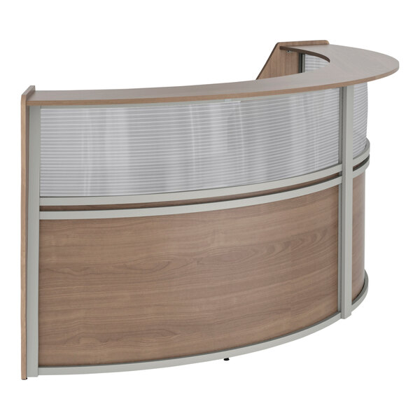 A Correll walnut laminate curved reception desk with glass panels.
