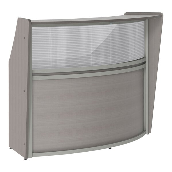 A grey Correll laminate reception desk with a curved front.