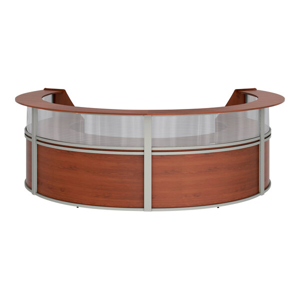 A Correll cherry laminate curved reception desk with a see-through top panel.