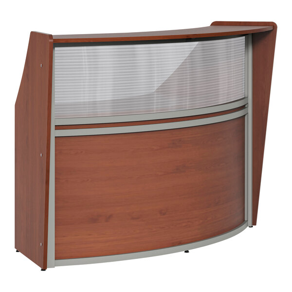 A Correll cherry laminate reception desk with a glass top panel.