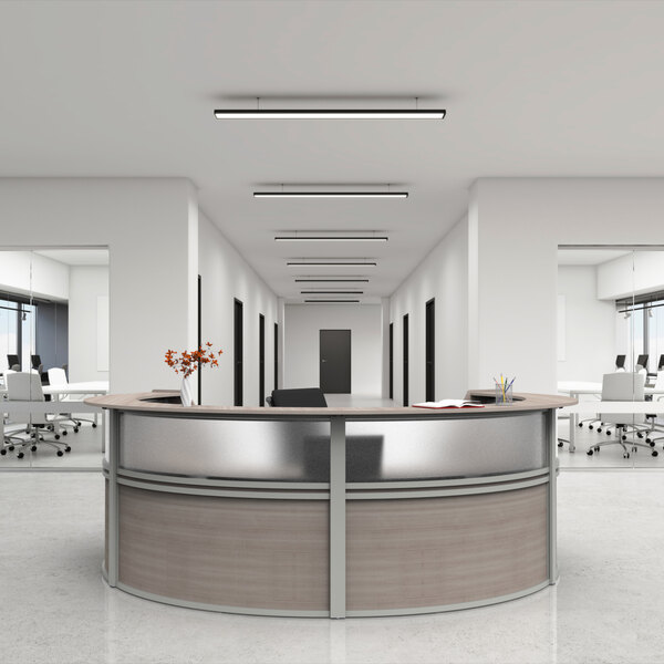 A Correll ash laminate reception desk with a curved U-shape panel.