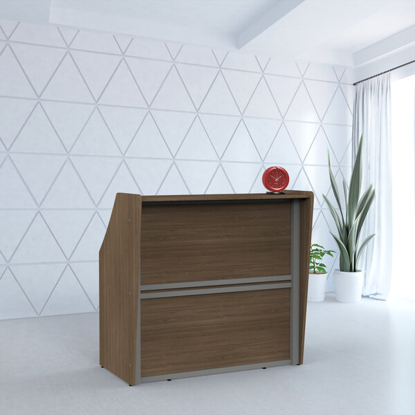 A Correll walnut laminate reception desk with a wooden top.