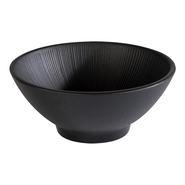 A black APS Nero melamine bowl with a spiral design.