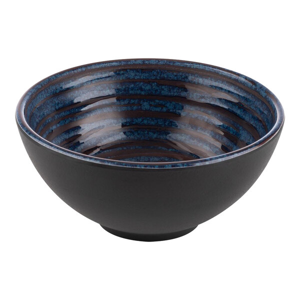 An APS round melamine bowl with blue stripes.