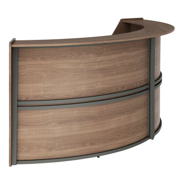 A Correll walnut laminate reception counter with curved wooden panels.