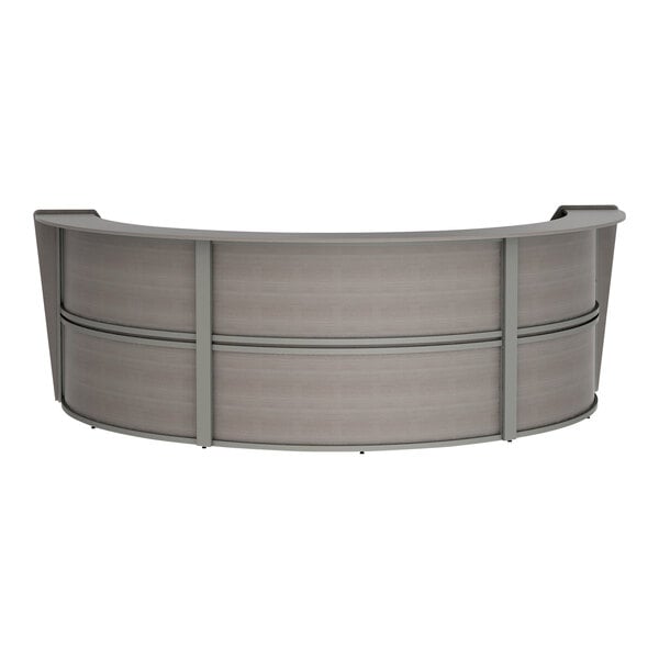 A Correll curved reception desk with an ash laminate finish.