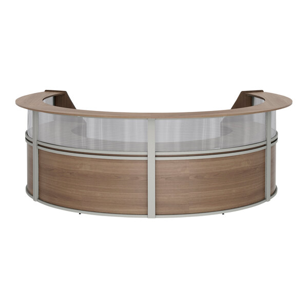 A Correll walnut laminate curved reception desk with glass panels.