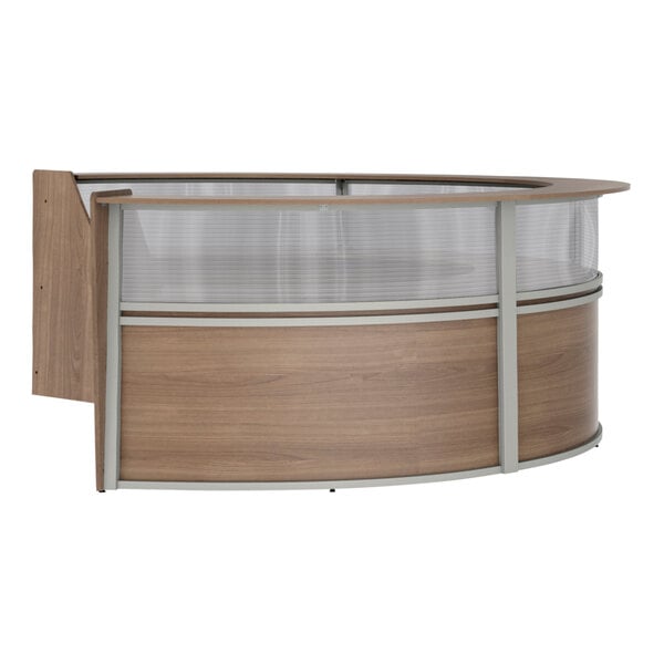A curved wooden desk with glass panels.