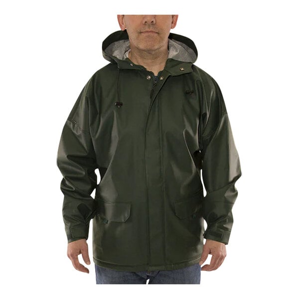 A man wearing a Tingley green rain jacket.