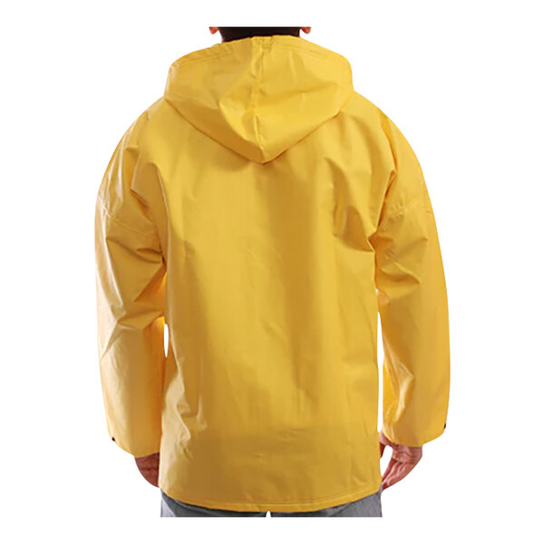 The back of a person wearing a yellow Tingley DuraScrim jacket.