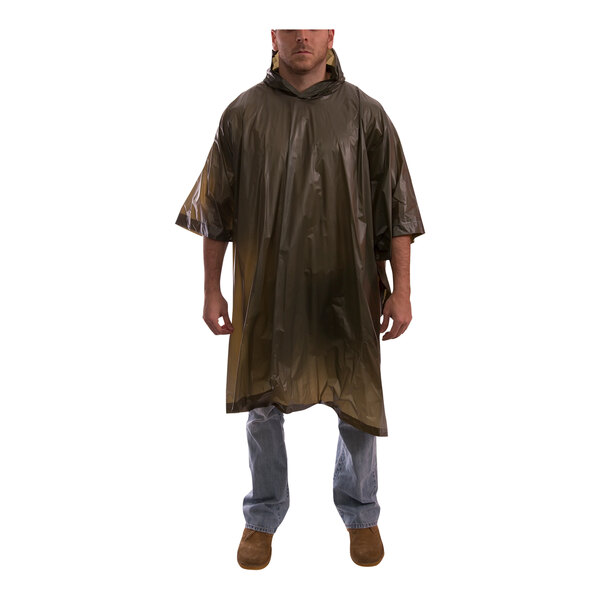 A man wearing an olive drab Tingley rain poncho.