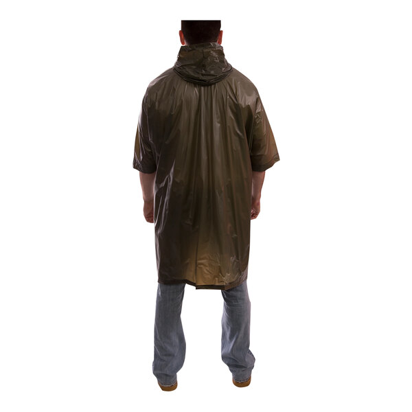 A man wearing an olive drab Tingley rain poncho.