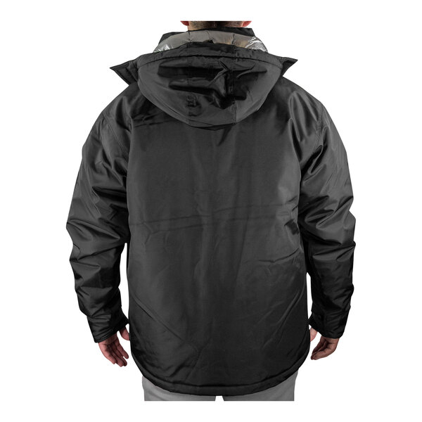 A person wearing a black Tingley insulated jacket with a detachable hood.