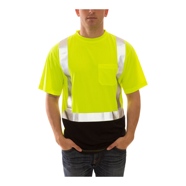 A man wearing a Tingley hi-vis lime safety shirt with black front panel.