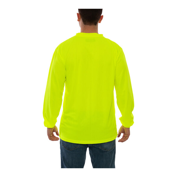 A man wearing a Tingley hi-vis yellow long sleeve safety shirt.
