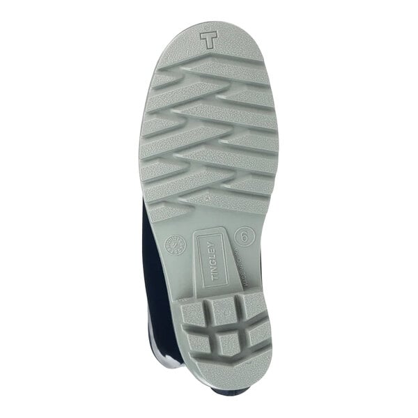 The non-slip sole of a Tingley knee boot.