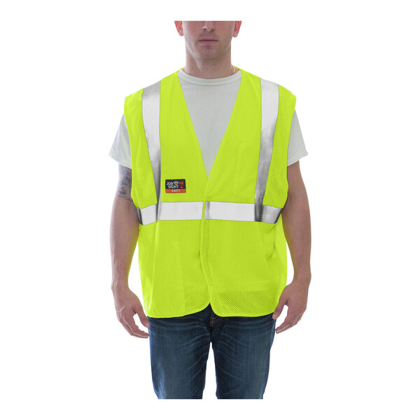 A man wearing a Tingley Job Sight yellow safety vest.