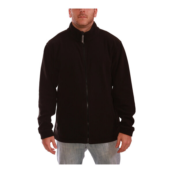 A man wearing a black Tingley Phase 1 fleece jacket.