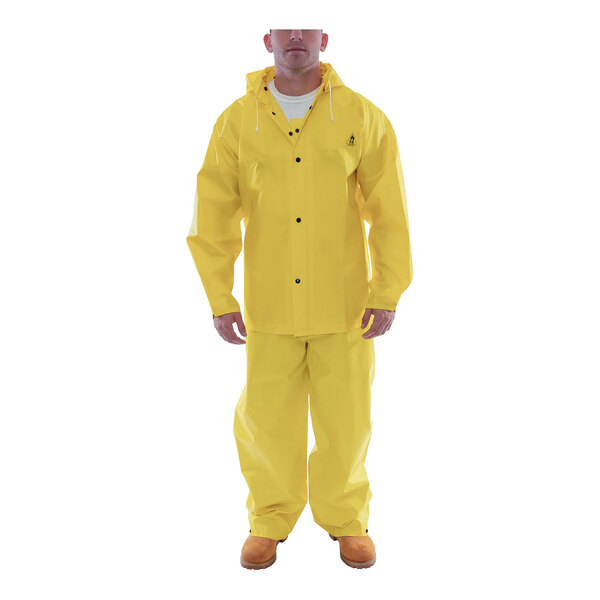 A man wearing a yellow Tingley DuraScrim rain suit.