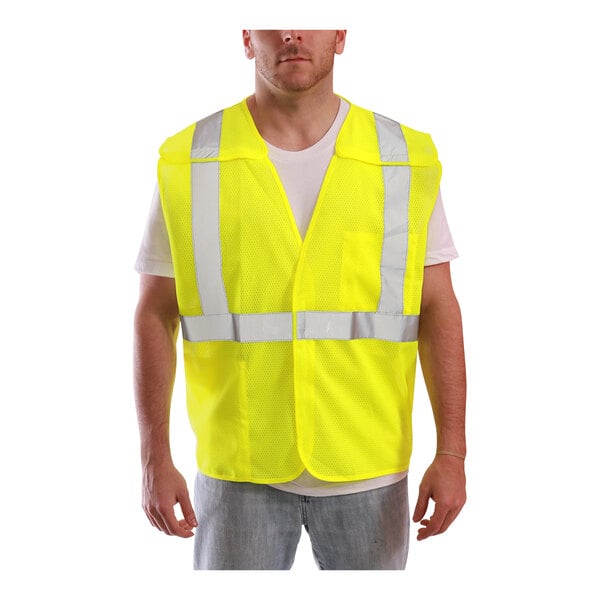 A man wearing a Tingley Job Sight lime mesh safety vest.