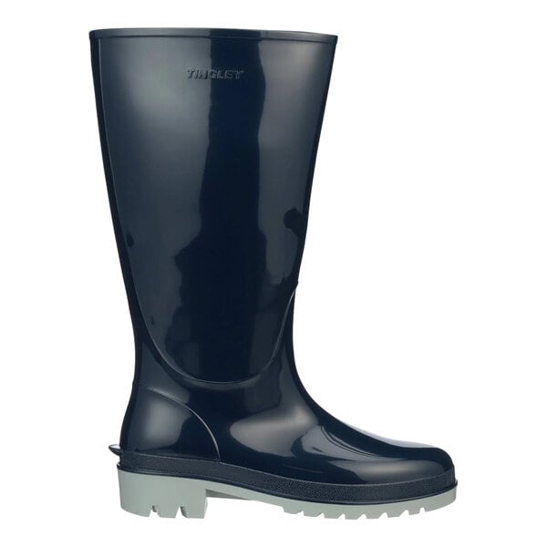 A Tingley women's navy waterproof knee boot with a rubber sole.