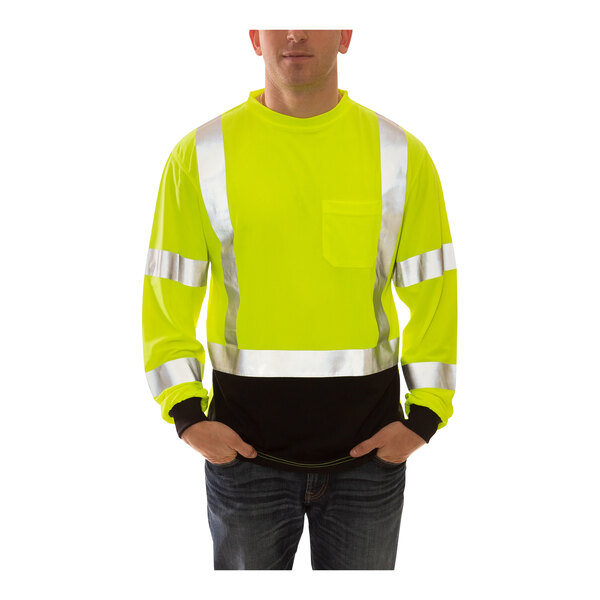 A man wearing a Tingley hi-vis yellow safety shirt with black front panel.