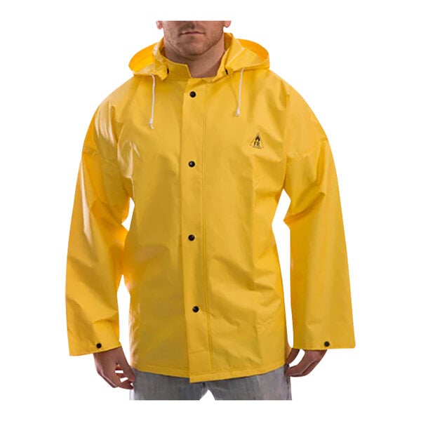 A person wearing a yellow Tingley DuraScrim jacket.