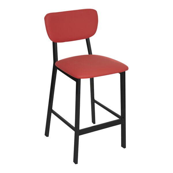 A BFM Seating Hamilton red vinyl restaurant bar stool with black legs.