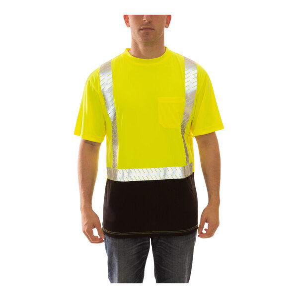 A man wearing a Tingley hi-vis lime safety shirt with a black front panel.