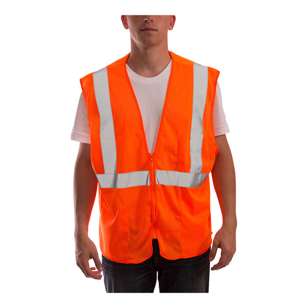 A man wearing a Tingley hi-vis orange safety vest with reflective stripes.
