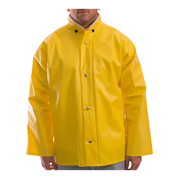 A man wearing a yellow Tingley Webdri rain jacket.