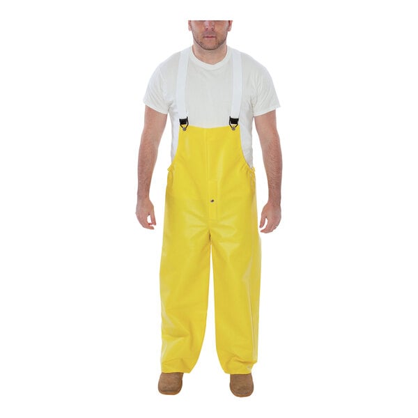 A man wearing yellow Tingley Webdri overalls.