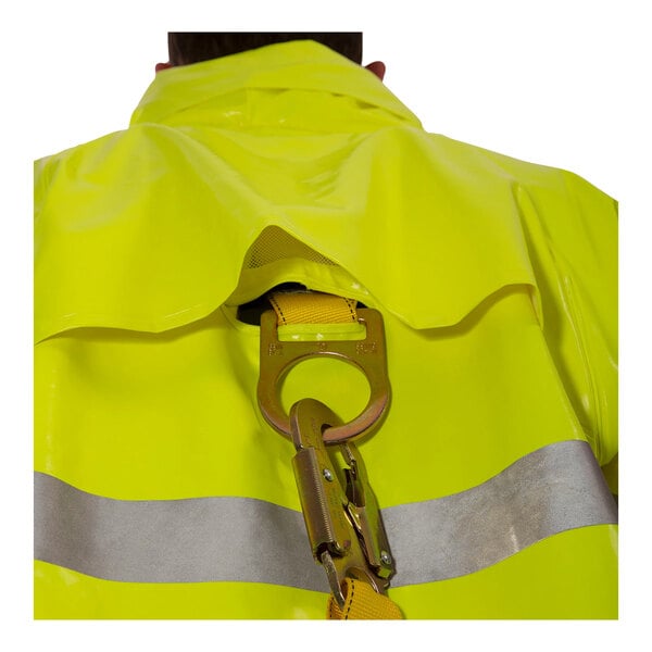 A person wearing a Tingley Comfort-Brite hi-vis lime rain jacket.