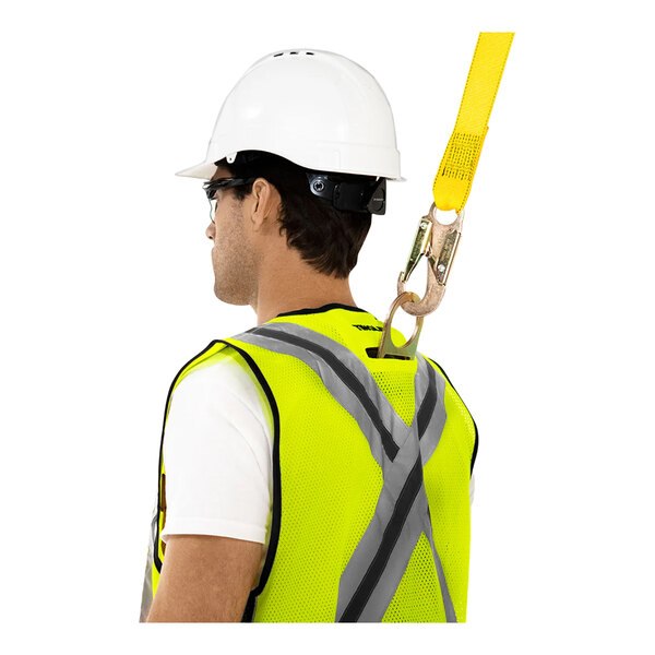 A man wearing a Tingley hi-vis lime safety vest and a white hard hat.