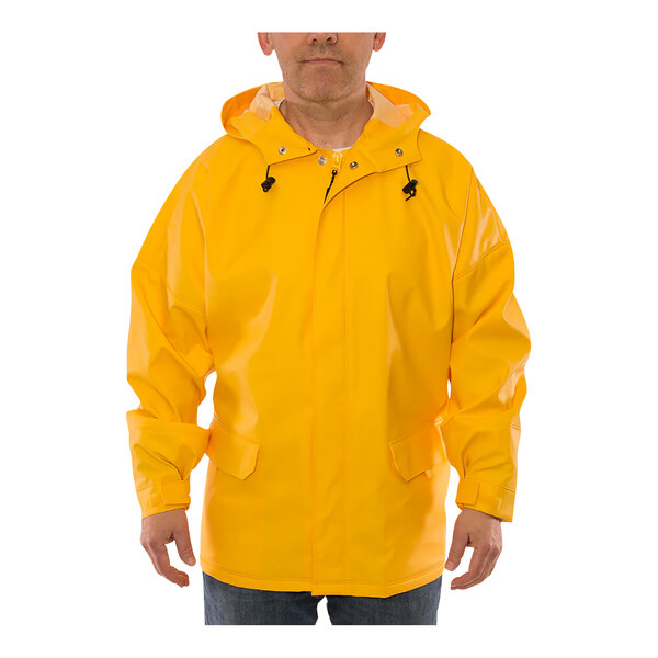 A man wearing a yellow Tingley Weather-Tuff rain jacket.
