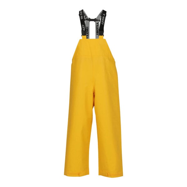 Yellow Tingley Weather-Tuff rain overalls with straps.