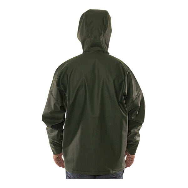 A man wearing a green Tingley Weather-Tuff rain jacket.