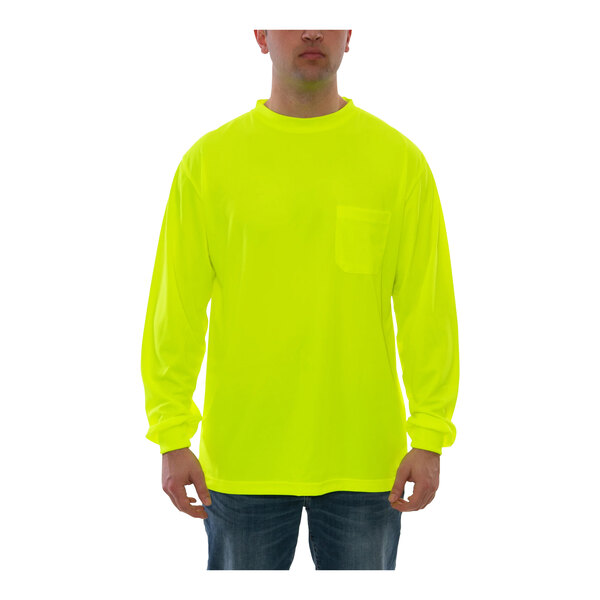 A person wearing a Tingley hi-vis lime long sleeve safety shirt.