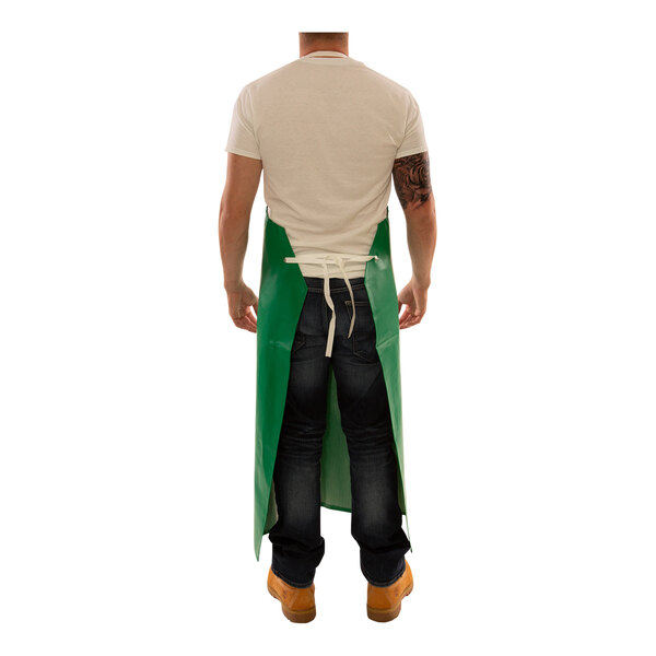 A man wearing a green Tingley SafetyFlex dishwashing apron.