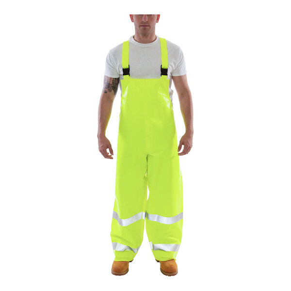 A man wearing Tingley Eclipse Class E hi-vis lime yellow overalls.