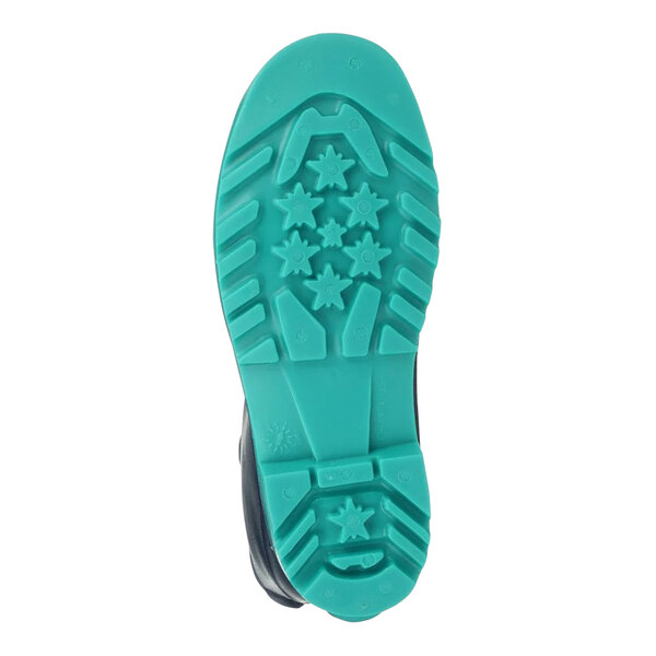 The blue sole of a Tingley StormTracks youth rain boot with green stars.