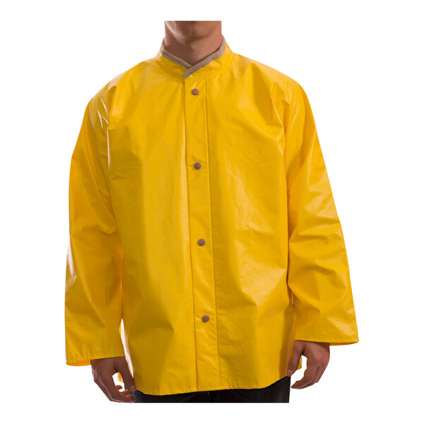 A man wearing a yellow Tingley industrial work jacket.