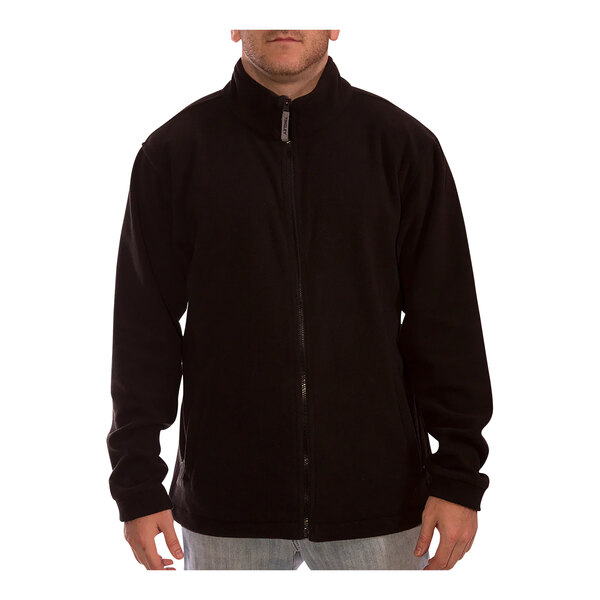 A man wearing a Tingley lime green and black industrial work jacket.