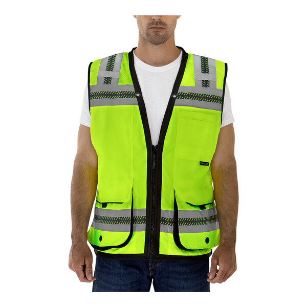 A man wearing a Tingley hi-vis yellow safety vest.